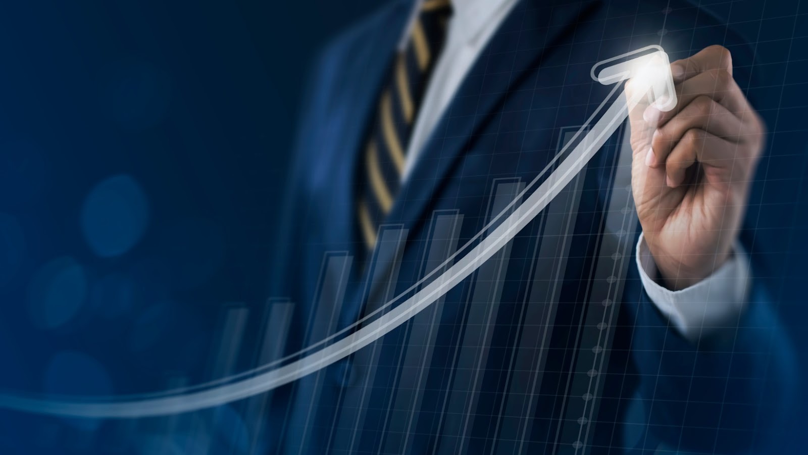 image Why Companies Are Rethinking Headquarters in 2026 A man in a suit in the background outlining a growth graph